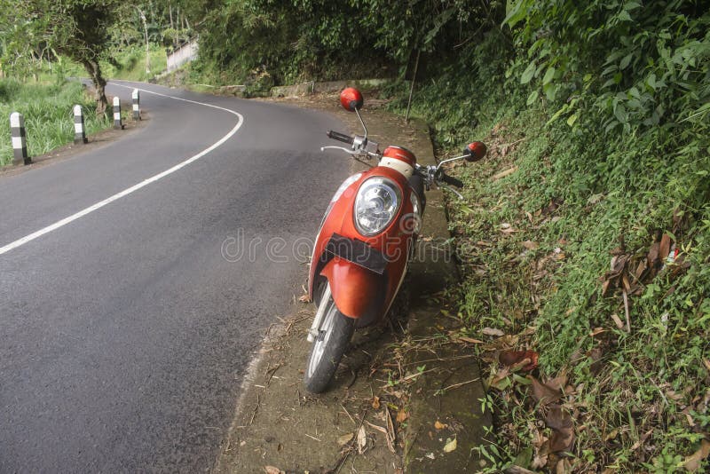 Indonesia - December Red Honda Scooter. Motorcycle Parked in a Countryside Road. Editorial Image - Image cycle, cool: 204602350