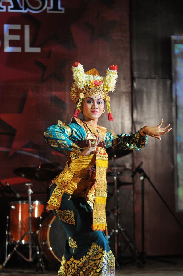 Balinese Dancers Wearing Traditional Costume and Performing Traditional ...