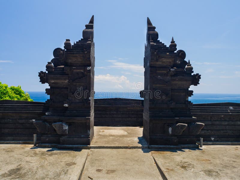 BALI, INDONESIA - MARCH 11, 2017: Entrance of an Indu temple in Ubud, in the island of Bali, located in Indonesia stock photo BALI, INDONESIA - MARCH 11, 2017: Entrance of an Indu temple in Ubud, in the island of Bali, located in Indonesia stock photo