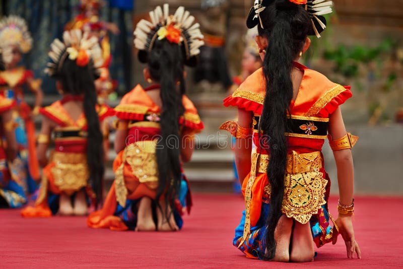 Balinese dancer girls in traditional Sarong costume dancing Legong dance