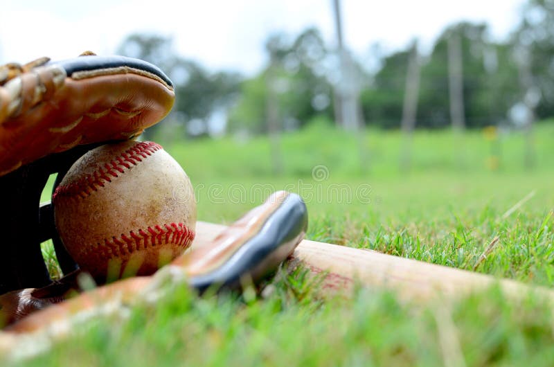 Ball in glove with baseball bat stock photo Ball in glove with baseball bat stock photo