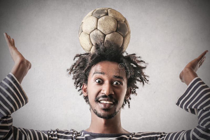 With a ball on his head stock photo. Image of balance 46726300