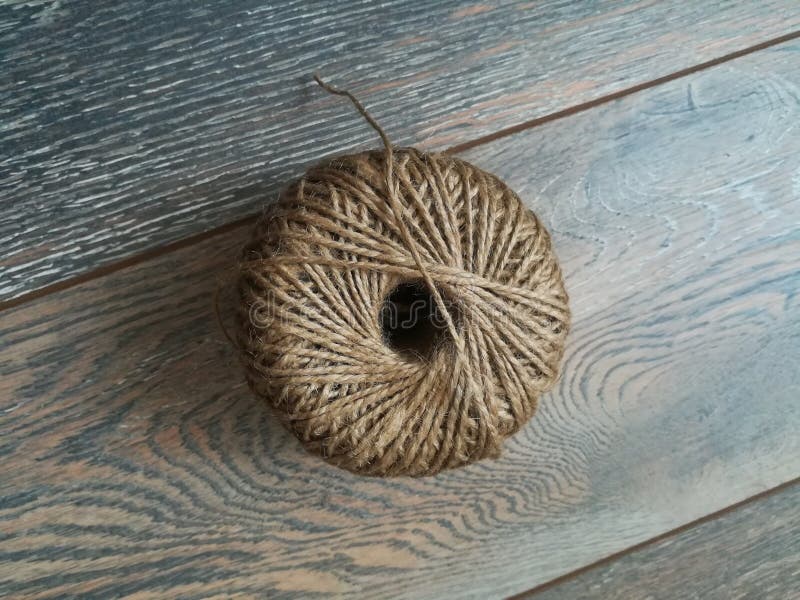 A Ball of Jute Thread on a Laminate Floor Stock Image Image of