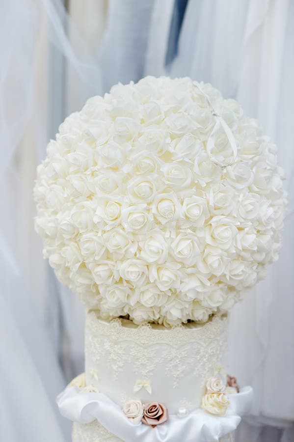 Ball of white roses as wedding decoration. Ball of white roses as wedding decoration