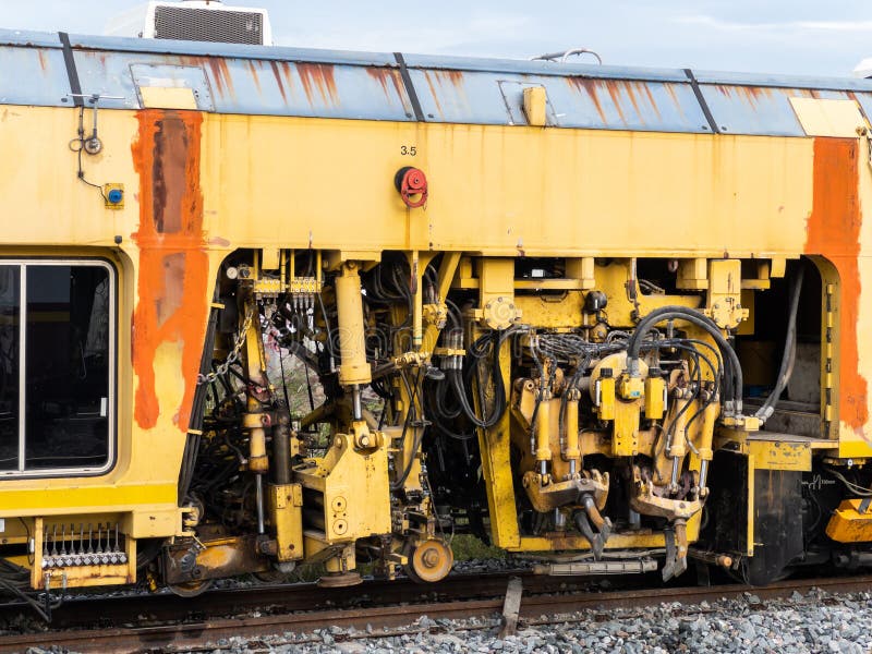 The Ballast Tamping Machine is Working To Maintain the Sleeper and