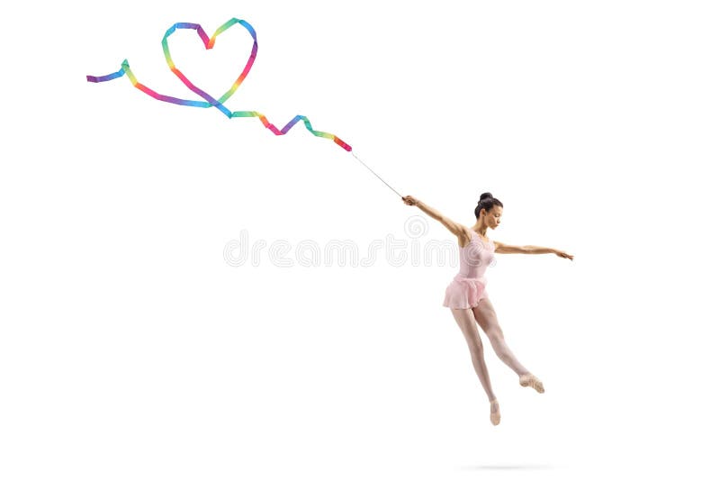Full length shot of a ballerina dancing and making a heart shape with a ribbon isolated on white background