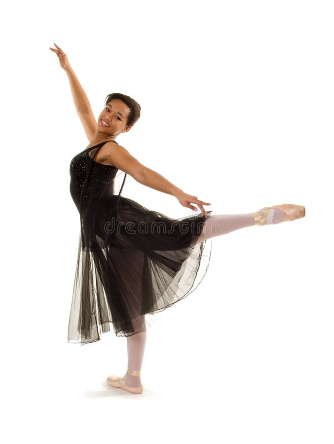Ballerine de sourire dans l'arabesque photographie stock libre de droits Ballerine de sourire dans l'arabesque photographie stock libre de droits