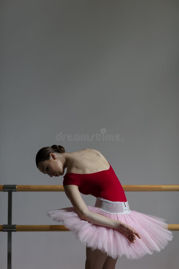 Beautiful ballerina training in the class stock photos