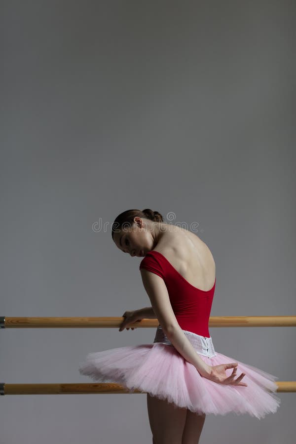 Beautiful ballerina training in the class stock image
