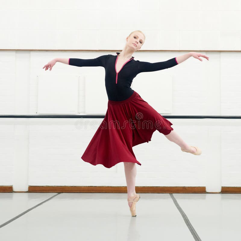 Ballet keeps me on my toes. Portrait of a young woman practising ballet.