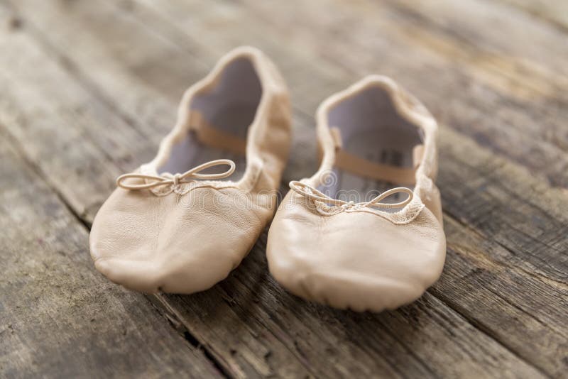 Ballet Shoes Laying on Rough Vintage Wood Stock Image - Image of ...