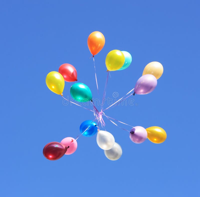 Photo libre de droit de Sourire Ballons Lumineux Volant Dans Le