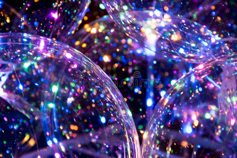 beaucoup de boules d'hydrogel de couleurs différentes. ensemble d'orbis  multicolores. perles d'eau en cristal pour les jeux. ballons à l'hélium.  peut être utilisé comme arrière-plan. gel polymère gel de silice. 4538894  Photo