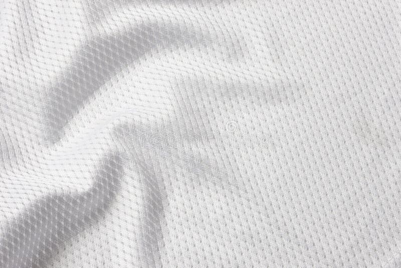 Close up shot of white textured football jersey. Close up shot of white textured football jersey