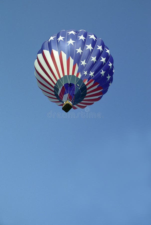 A hot-air balloon with a patriotic motif flying over Warren County, Iowa. A hot-air balloon with a patriotic motif flying over Warren County, Iowa.