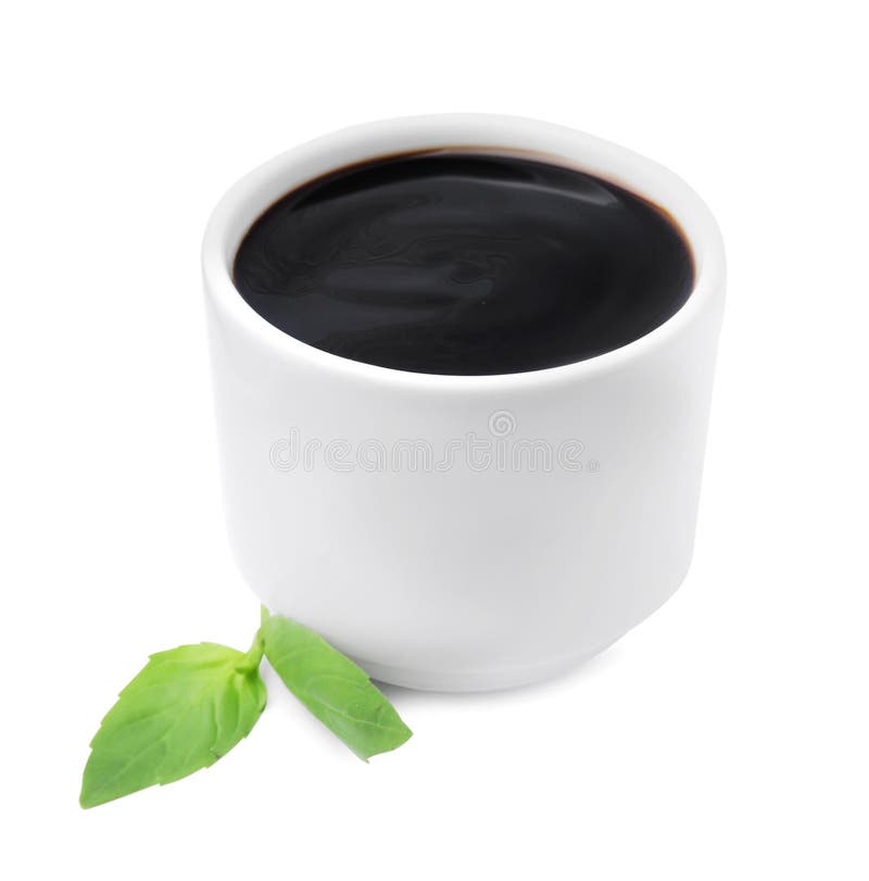 Balsamic Glaze and Basil Leaves on White Background Stock Photo Image