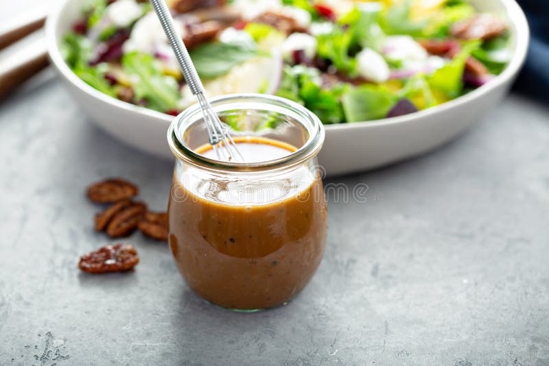 Balsamic vinaigrette dressing for a salad, small glass jar with a whisk. Addition salad stock images, royalty-free photos and pictures