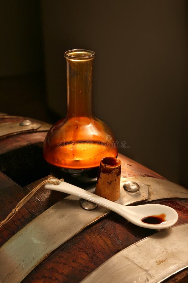 Balsamic vinegar of Modena, Italy, glass bottle containing special sweetening Modena royalty free stock photography Balsamic vinegar of Modena, Italy, glass bottle containing special sweetening Modena royalty free stock photography