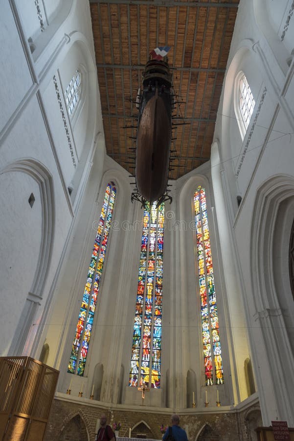 Altar window and model ship of St. Peter`s Church, in German Petrikirche,Rostock