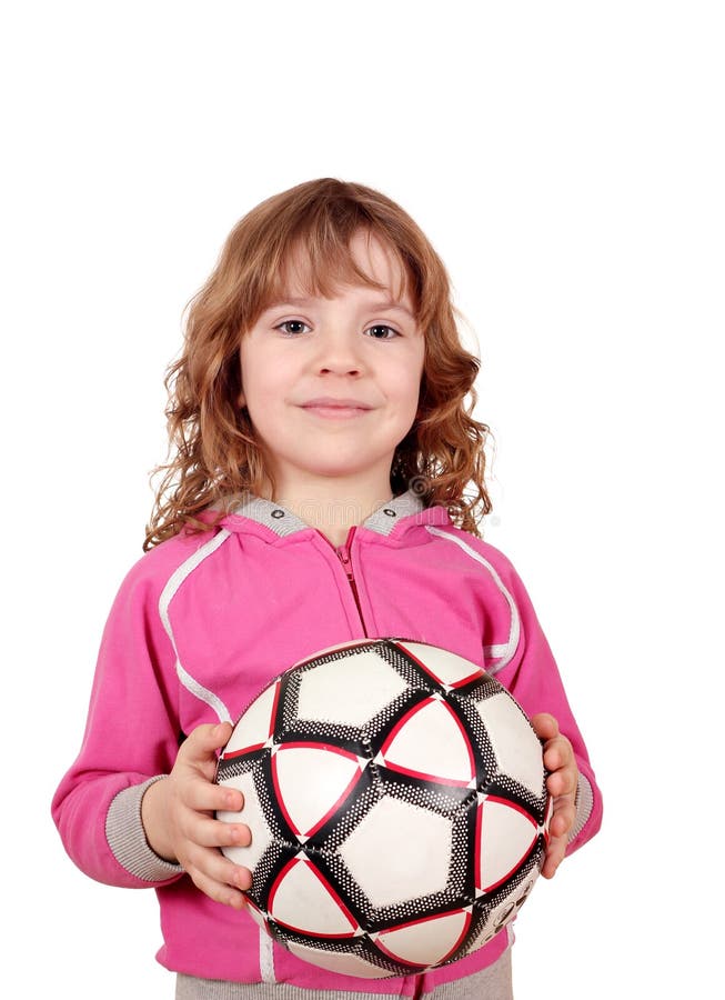 Balón de fútbol feliz del asimiento de la niña foto de archivo libre de regalías Balón de fútbol feliz del asimiento de la niña foto de archivo libre de regalías