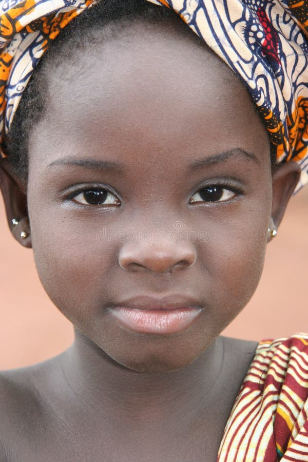 Young girl in Africa with a curious look. Young girl in Africa with a curious look