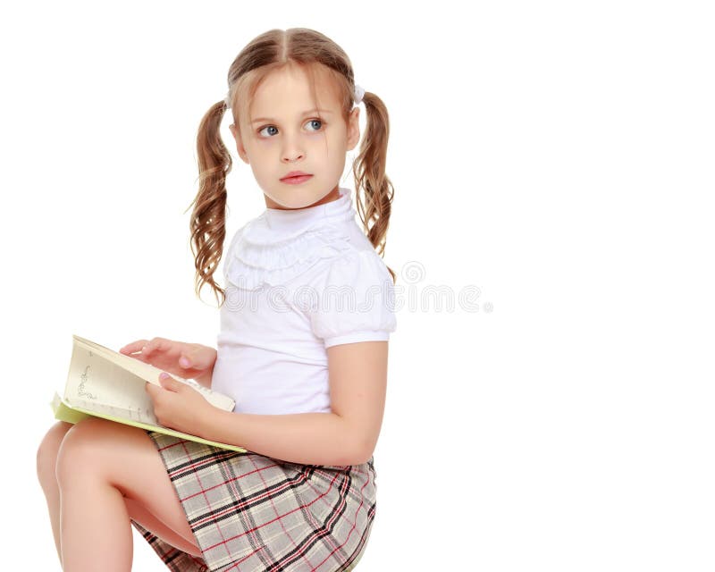 Bambina con un libro fotografie stock