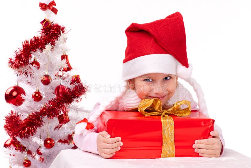 Bambina felice con regalo di Natale fotografie stock libere da diritti Bambina felice con regalo di Natale fotografie stock libere da diritti