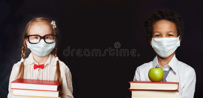 Happy children in protective face mask on black banner background, back to school and covid-19 concept. Happy children in protective face mask on black banner background, back to school and covid-19 concept.