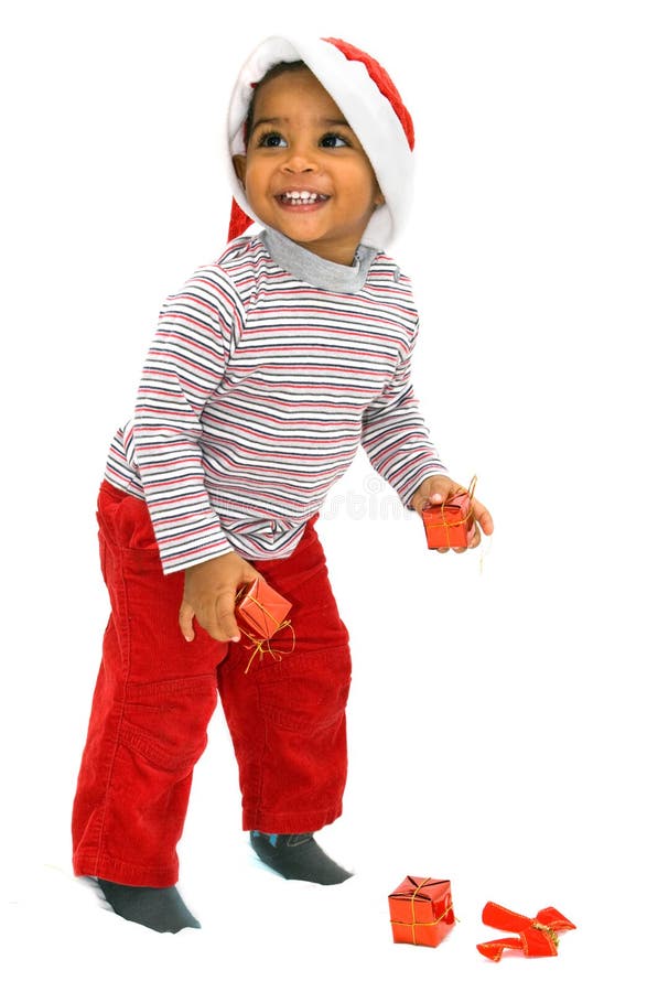 Bambino del mulatto su una priorità bassa bianca immagini stock Bambino del mulatto su una priorità bassa bianca immagini stock