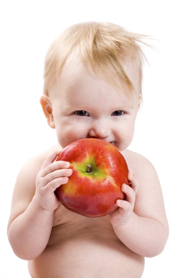 Bambino e mela immagini stock libere da diritti Bambino e mela immagini stock libere da diritti