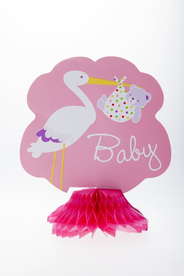 A baby girl centerpiece against a white background. A baby girl centerpiece against a white background