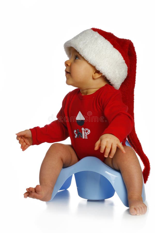 Bambino in protezione del Babbo Natale immagine stock Bambino in protezione del Babbo Natale immagine stock