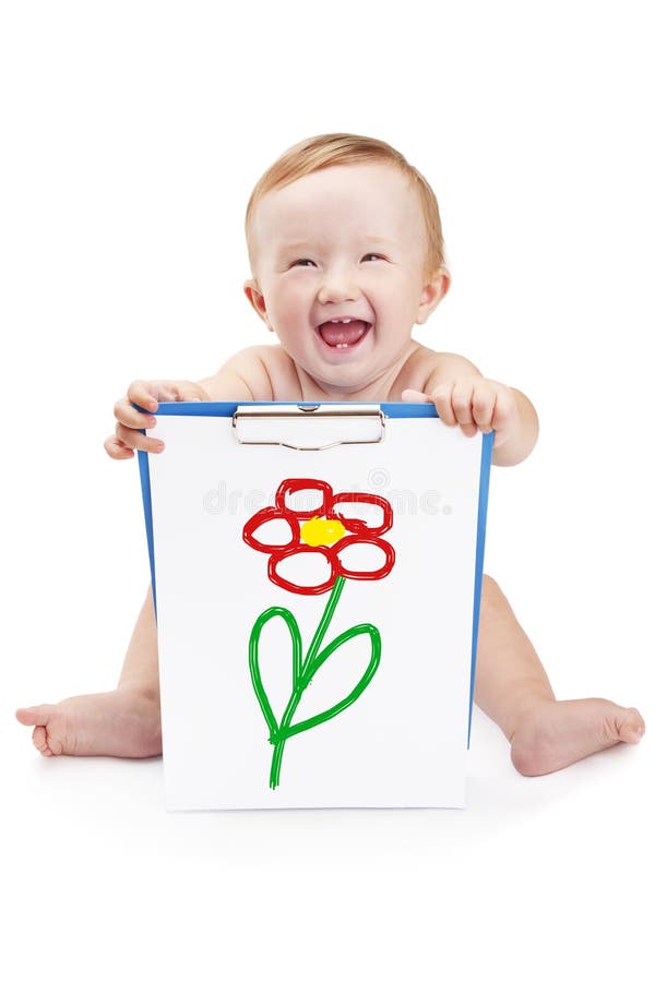 Bambino sorridente che tiene una lavagna per appunti fotografia stock Bambino sorridente che tiene una lavagna per appunti fotografia stock