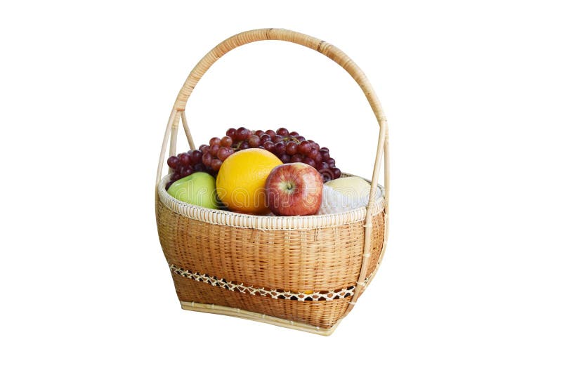 Bamboo basket put on a variety of fruit as orange, apple, grapes and pear.