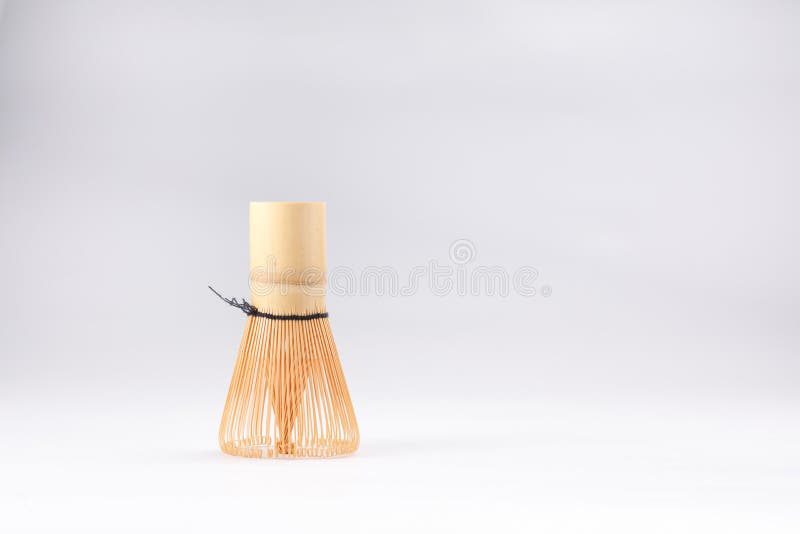 Bamboo Brush Tea Whisk Called Matcha on White Background. Closeup