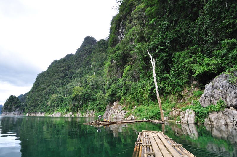 Bamboo raft heading on lake