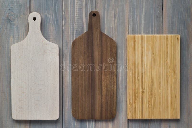 Bamboo wood cutting board on a wooden gray background