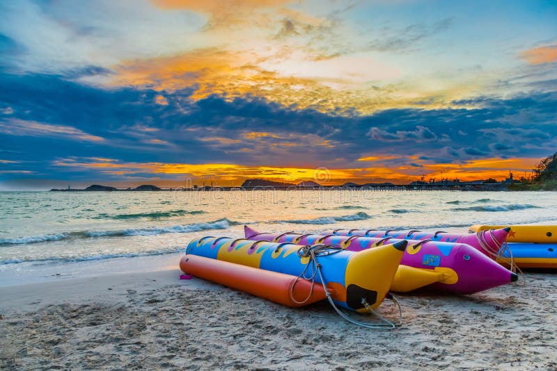 The banana boat with beautiful sky in the evening at Nang rum beach