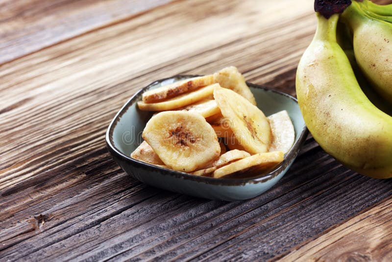 Banana Chips, Dehydrated Slices of Fresh Ripe Bananas. Stock Image
