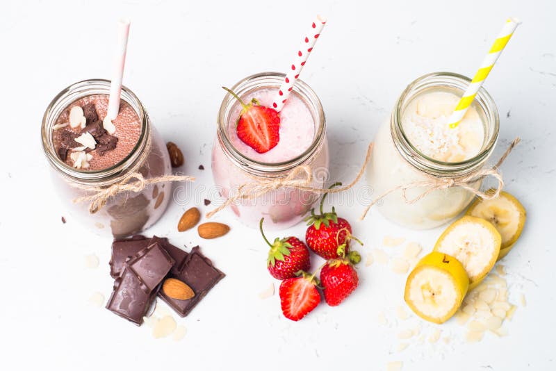 Banana chocolate and strawberry milkshakes