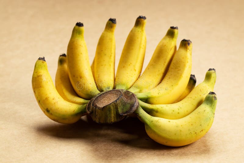 Banana Cluster On Brown Color Background Stock Photo Image Of Fiber