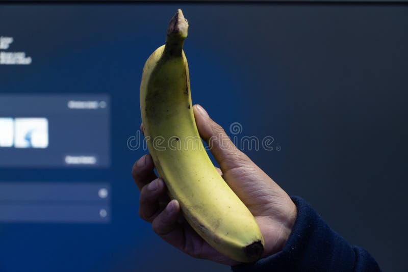 Banana in hand stock photo. Image of delicious, macro 261134038