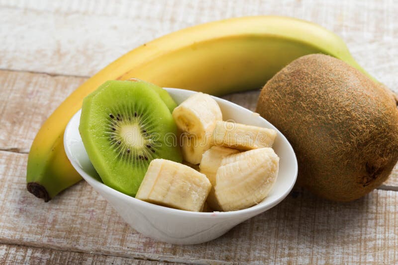 Banana And Kiwi Sliced In Bowl Stock Photo - Image of delicious ...