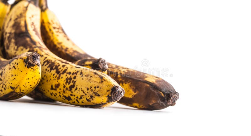 Banana. Over ripe bananas on white with shadows