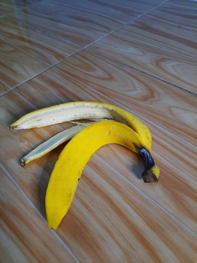 Banana peel on the floor stock image. Image of wing 209576283
