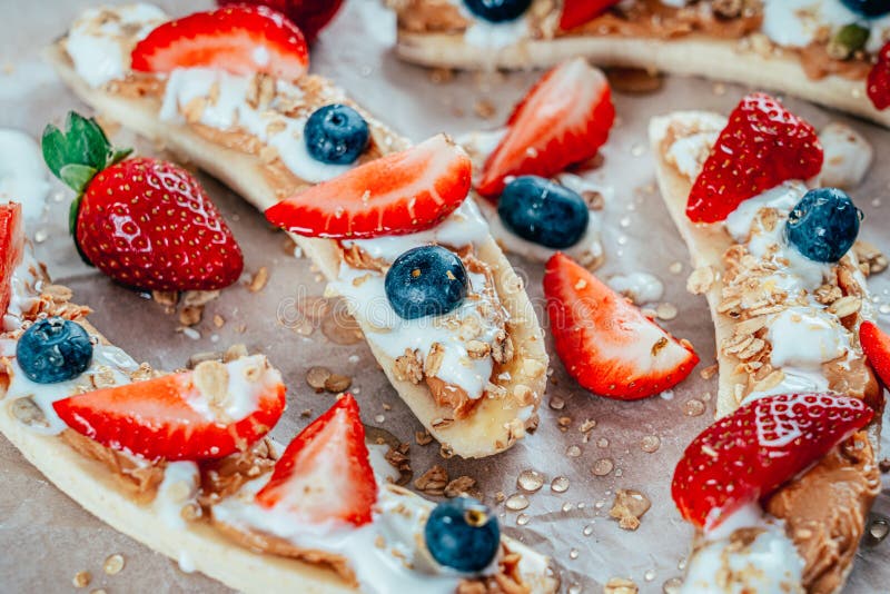 Banana Split With Strawberries, Blueberries, Almond Butter And Honey