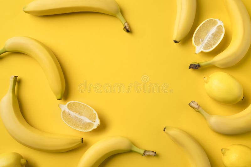 Bananas and lemons halves stock image. Image of eating - 103991149