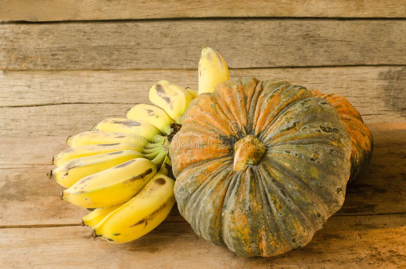 Bananas and Pumpkins on Wooden Table Stock Photo Image of halloween