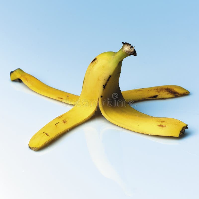 Banana peel on blue background. Banana peel on blue background