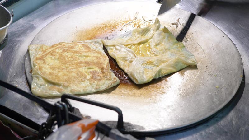 Bananenpfannkuchen gebraten in der heißen Wanne in Thailand, Rotee der Straßennahrung lizenzfreie stockfotos Bananenpfannkuchen gebraten in der heißen Wanne in Thailand, Rotee der Straßennahrung lizenzfreie stockfotos